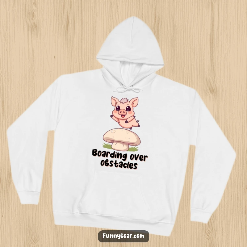 Funny Hoodie: A miniature boar with huge, expressive eyes leaping energetically over a massive mushroom, bringing a smile.